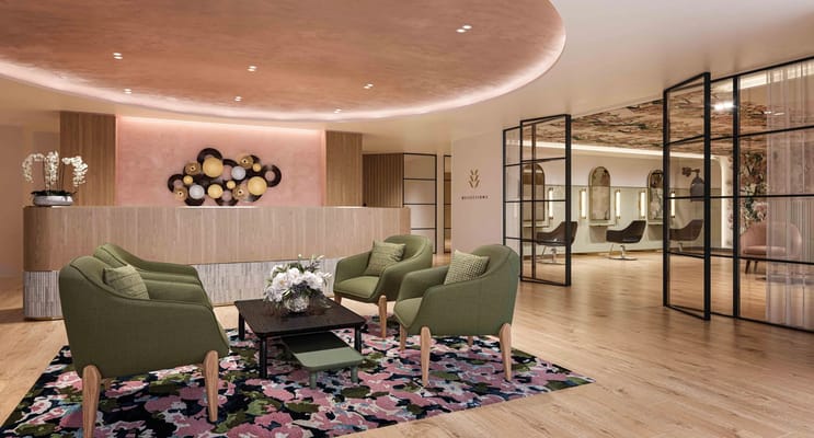 Well-decorated common area with seating and floral decor