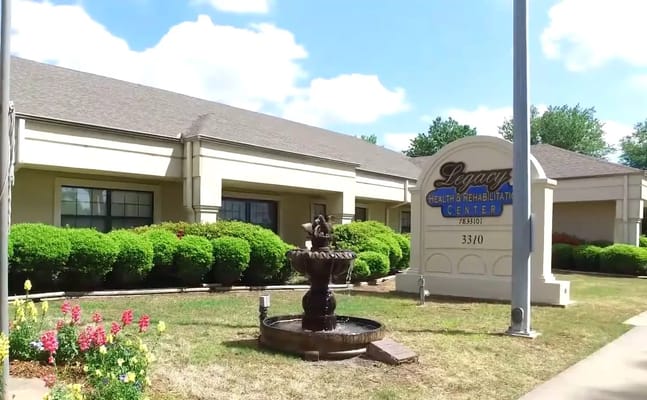 Exterior view of Legacy Health and Rehabilitation Center with fountain