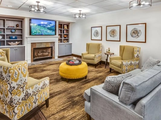 Comfortable common area with seating and television