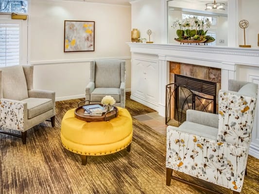 Bright and inviting common area with seating and decorations