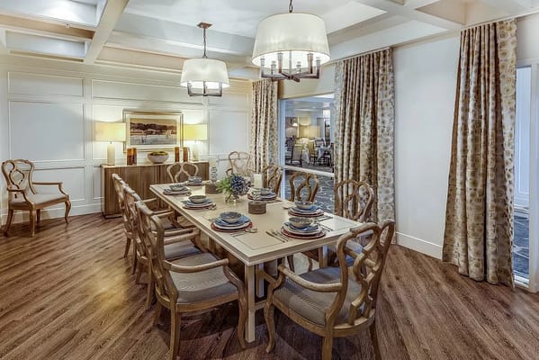 Dining room set for a meal in a cozy environment