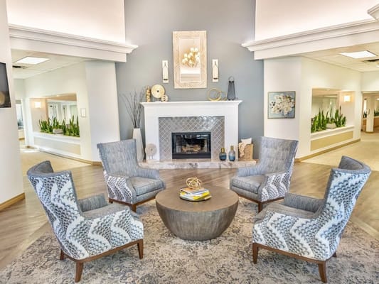 Welcoming common area with seating and a fireplace