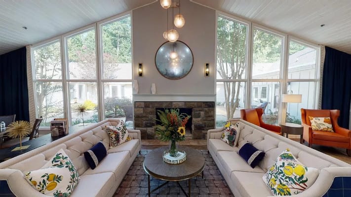 Bright interior common area with seating and decor