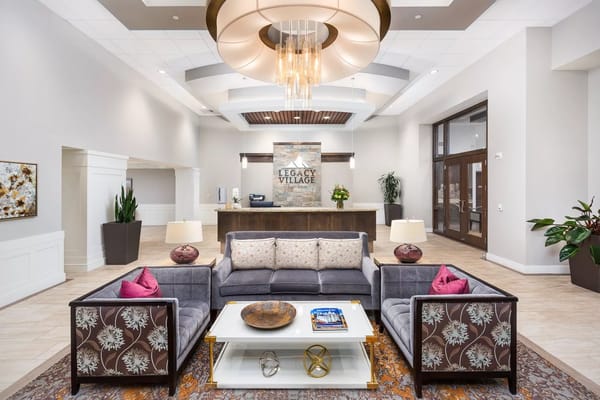 Modern lobby seating with decorative elements at Legacy Village of Sugar House