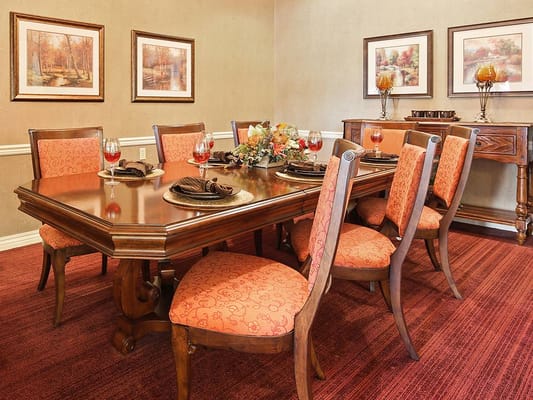 Elegant dining room with a large table and chairs