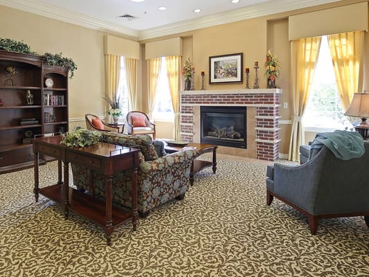 Interior common area with cozy furniture and fireplace