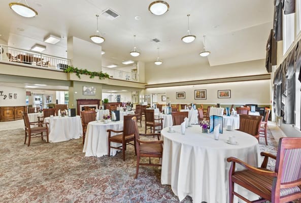 Dining area with neatly set tables and elegant decor