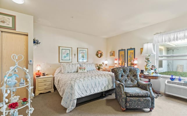 Cozy resident room with decor and comfortable furniture