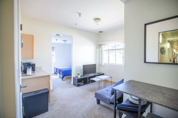 Interior view of a resident living space with furnishings
