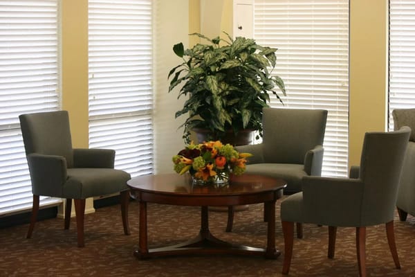 Inviting common area with comfortable seating and plants