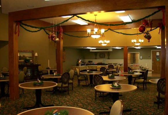 Cozy dining area with tables and holiday decorations