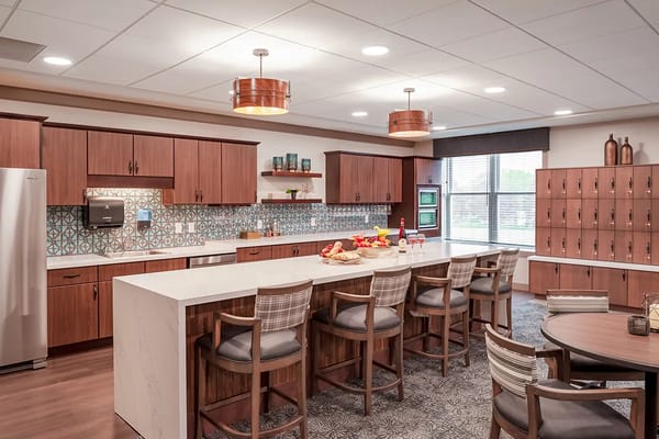 Interior view of a dining area with a kitchen setup