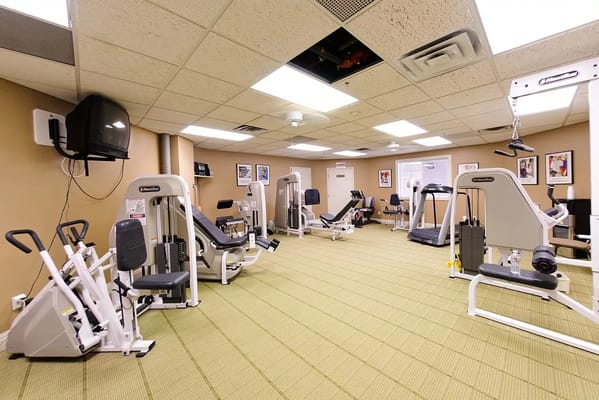 Well-equipped gym at Liberty Heights senior living facility