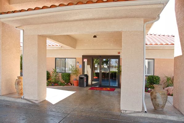 Entrance area of Life Care Center of Las Vegas with potted plants