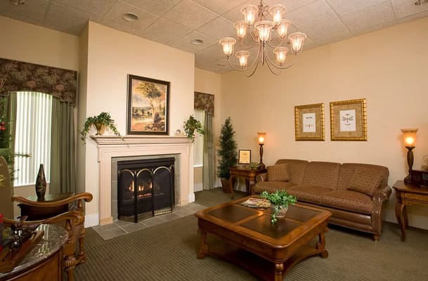 Cozy common area with a fireplace and seating