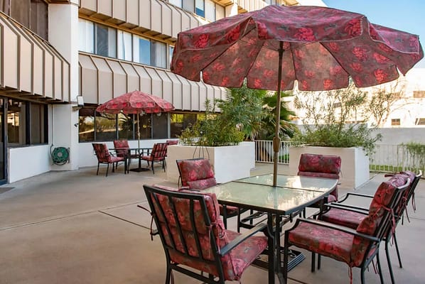 Outdoor seating area with umbrellas and tables