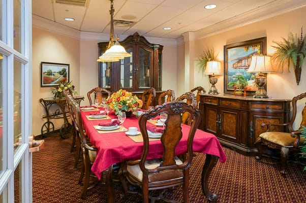 Elegant dining room setup with a large table and decorations