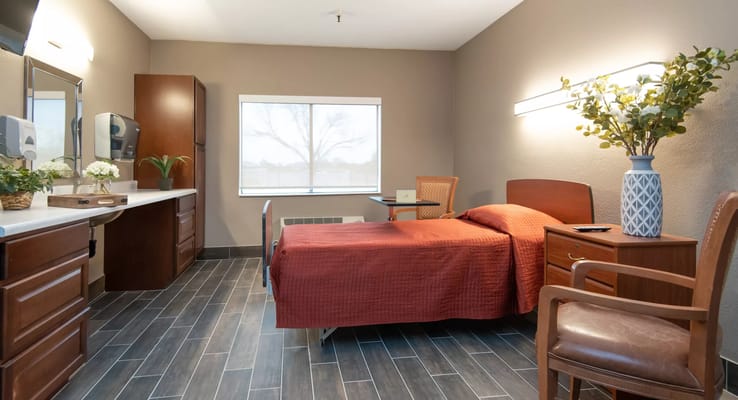 Well-furnished private room with a bed and amenities