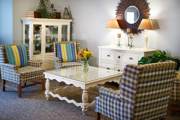 Cozy common area with chairs and decorative items