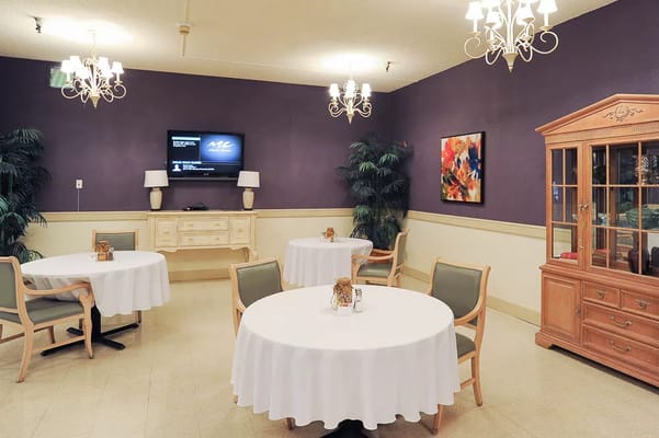 Dining area with tables and decorative furniture