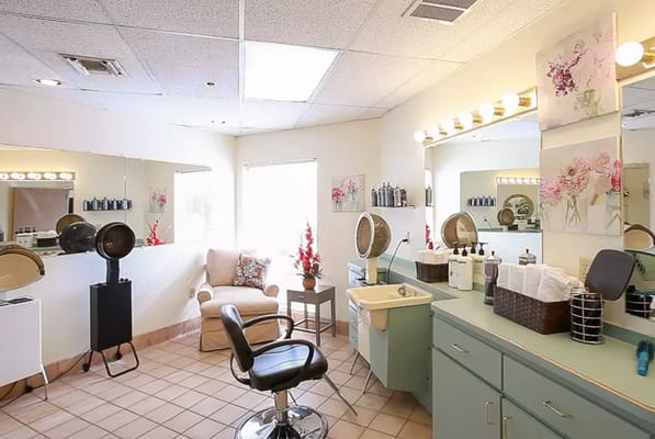 Interior of a hair salon with styling stations