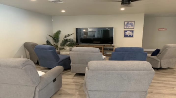 Common area with comfortable seating and a TV