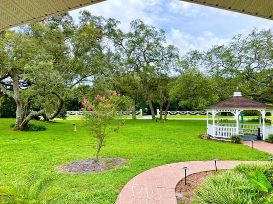Lush outdoor space with gazebo and garden