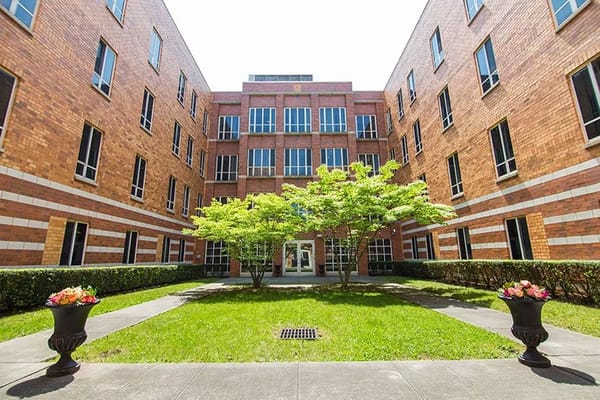 Exterior view of Linden Center with landscaped courtyard