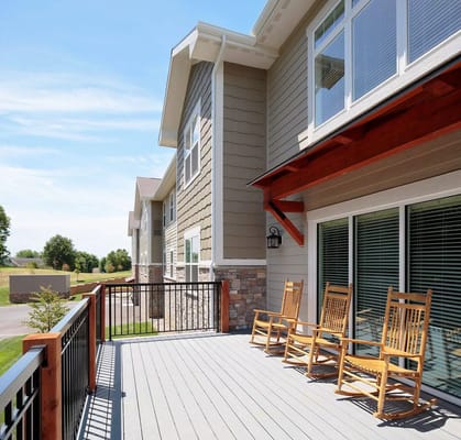 Outdoor patio area with rocking chairs