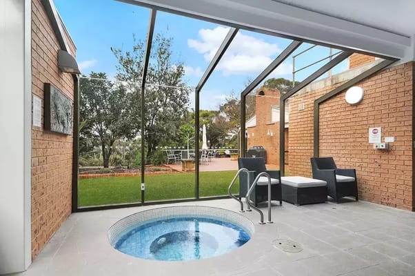 Indoor spa area with a view of the garden