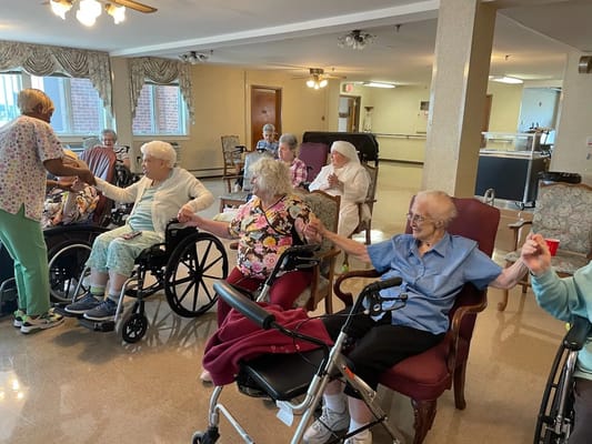 Residents participating in an activity in the common area