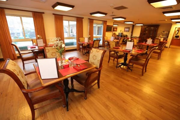 Dining room with tables set for a meal