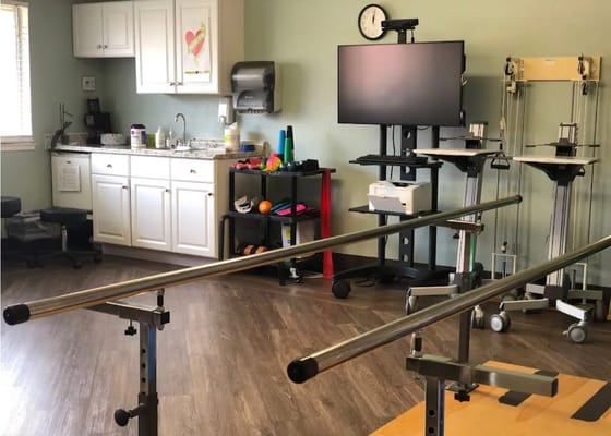 Physical therapy room with equipment