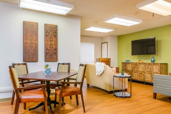 Cozy living room with seating and dining area