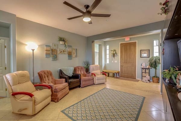 A welcoming living room with comfortable seating and decor at Lords Way Assisted Living.
