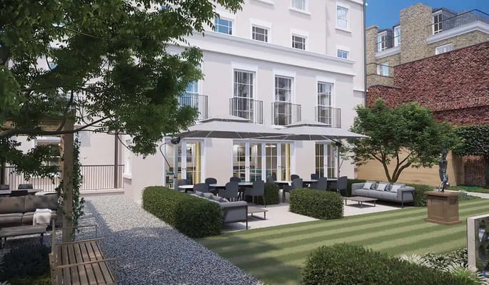 Outdoor patio area with seating and umbrellas