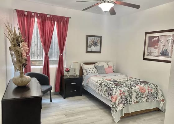 Cozy resident bedroom with floral bedding