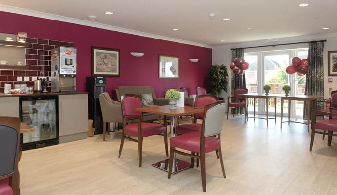Bright common area with tables and chairs