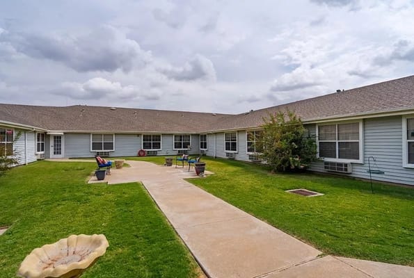 Outdoor courtyard with seating and garden area