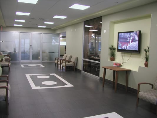 Interior common area with seating and television