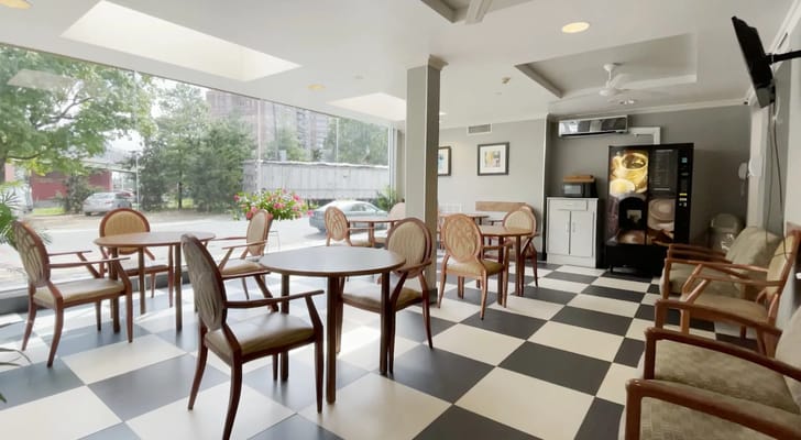 Bright dining area with tables and chairs