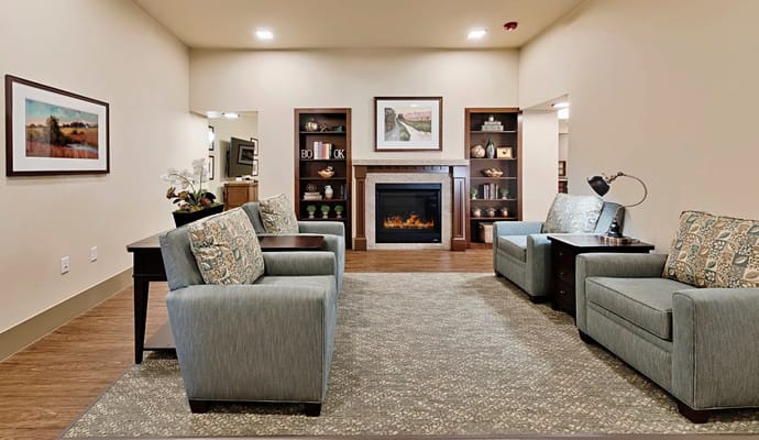 Cozy common area with seating and fireplace