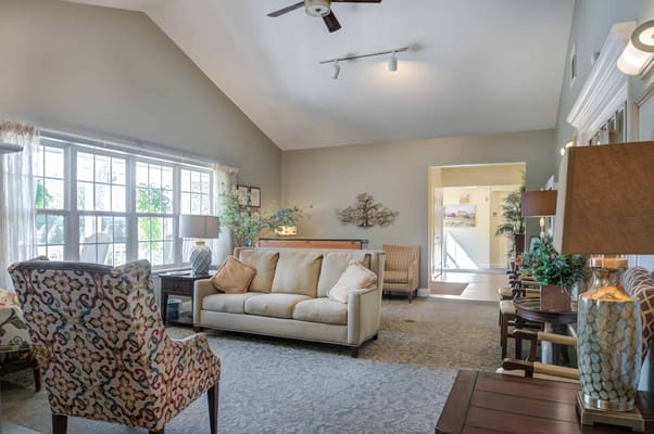 Bright common area with seating and natural light