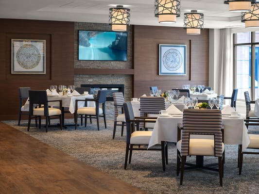 Elegant dining room setup with neatly arranged tables