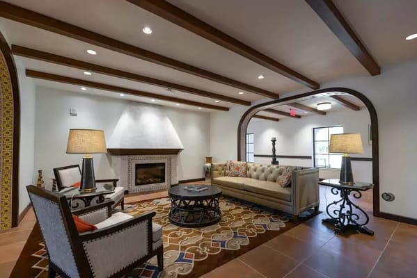 Bright and welcoming common area with seating and decor