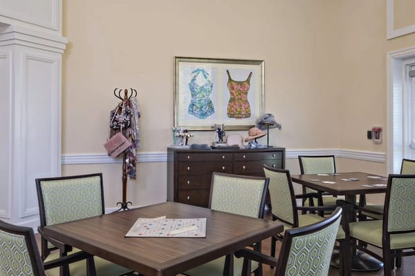 Interior view of a common area with tables.