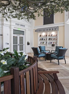 Bright common area with seating and post office