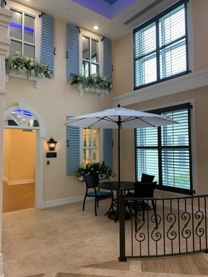 Bright common area with seating and decorative features