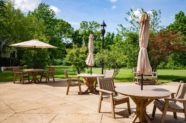 Outdoor patio with tables and umbrellas