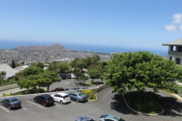 View of parking area and ocean from Maunalani Nursing and Rehabilitation Center